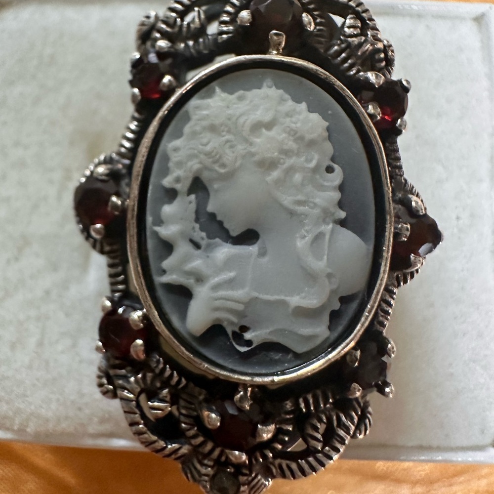Elegant Antique Silver Cameo Ring Surrounded by Garnets, and Marcasite.